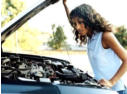 girl looking at car engine